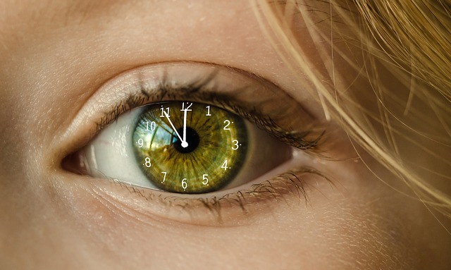 Women eye with clock inside