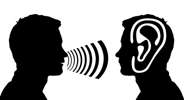 Person talking to someone and the other person hearing them talk