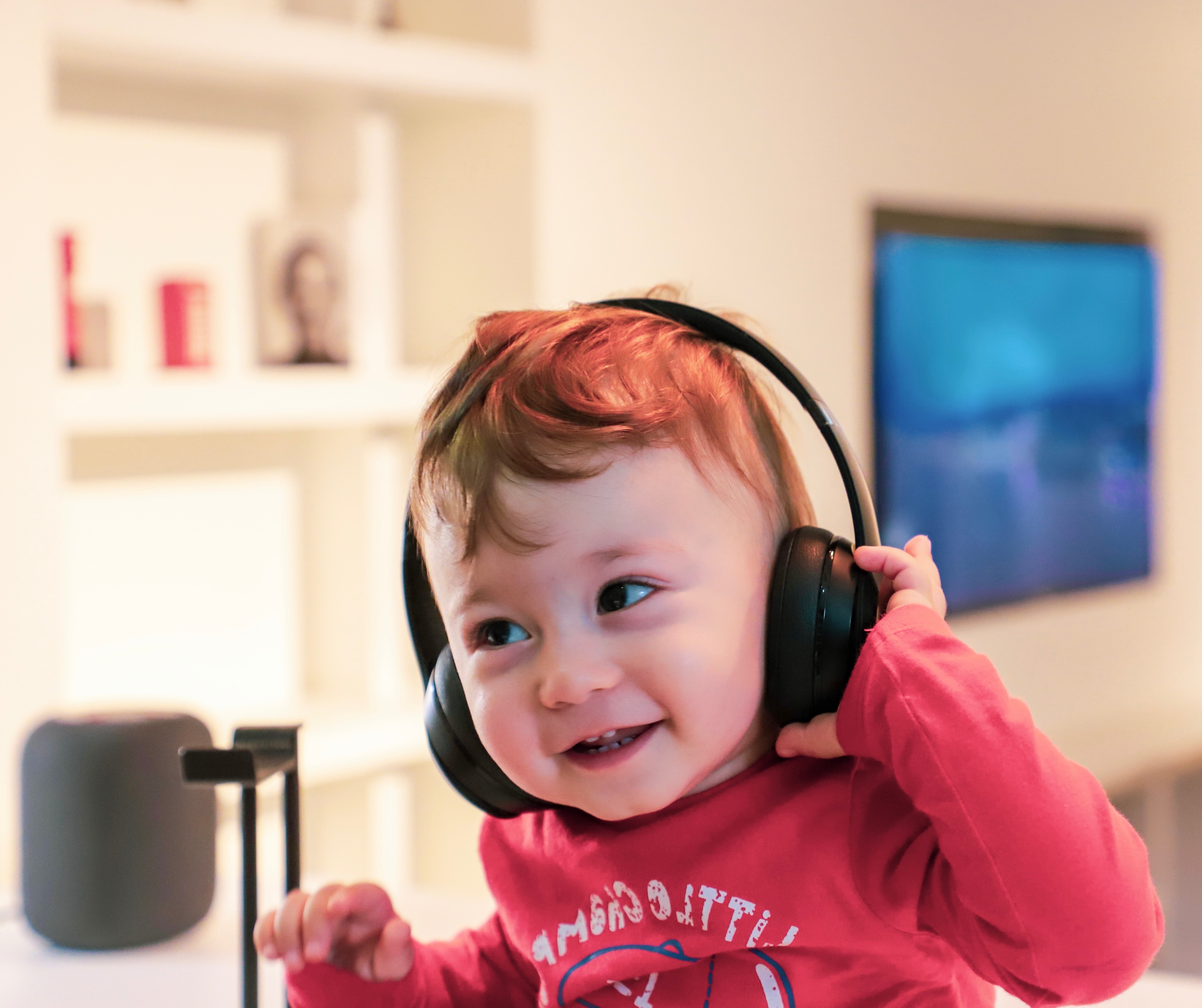 Infant wearing headphones
