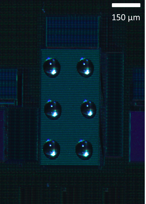 Fig. Image of a field effect transistor chip with over 16000 devices, used for biosensing applications with individual droplets. Droplets are roughly 250pL