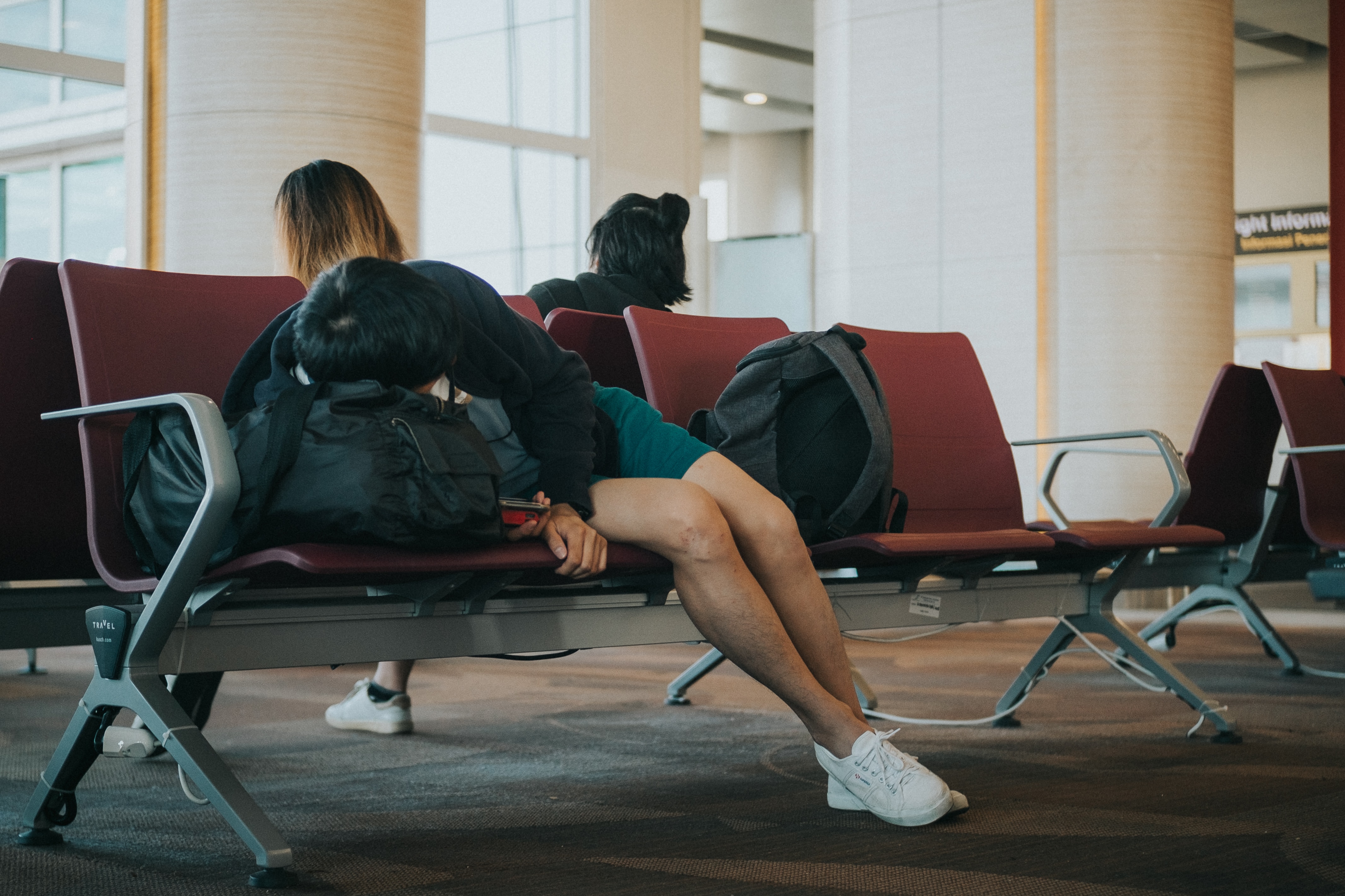 person sleeping at the airport