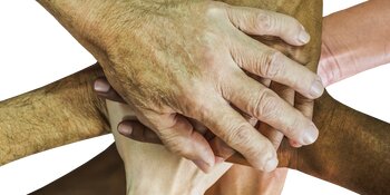 multicultural hands in a circle