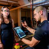 Graduate student Jonathan Cerna monitors heart data from a “smart shirt” that tracks electrical activity as graduate student Laila Shaaban exercises and rests. Researchers are working to develop the technology to make heart-related predictions more widely accessible through the use of wearables.