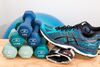 Blue gym shoe and blue weights