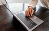 Typing on Laptop