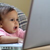 Baby Looking at a Laptop