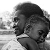 Mother Holding Her Child