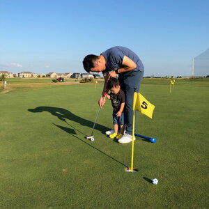 Pengfei Song Golfing with Son