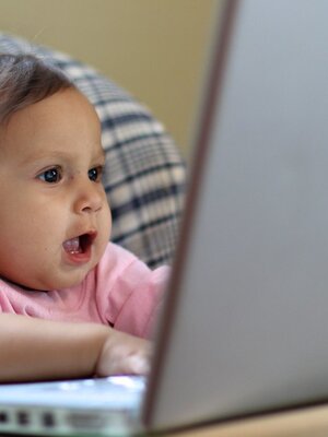 Baby Looking at a Laptop