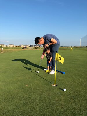 Pengfei Song Golfing with Son