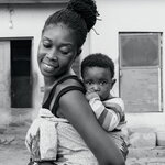 Mother Carrying Her Child